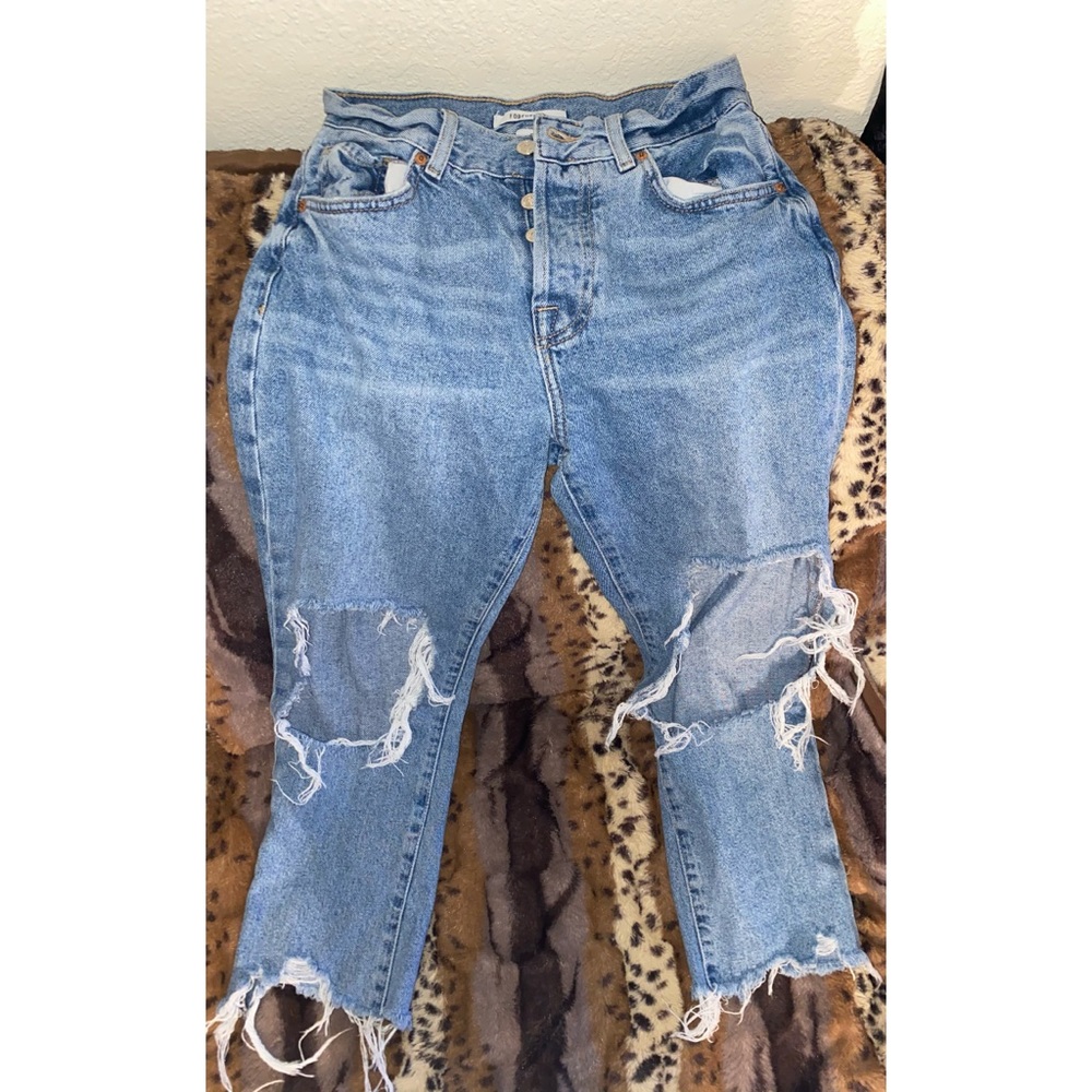 medium-washed ripped mom jeans. - Picture 1 of 4